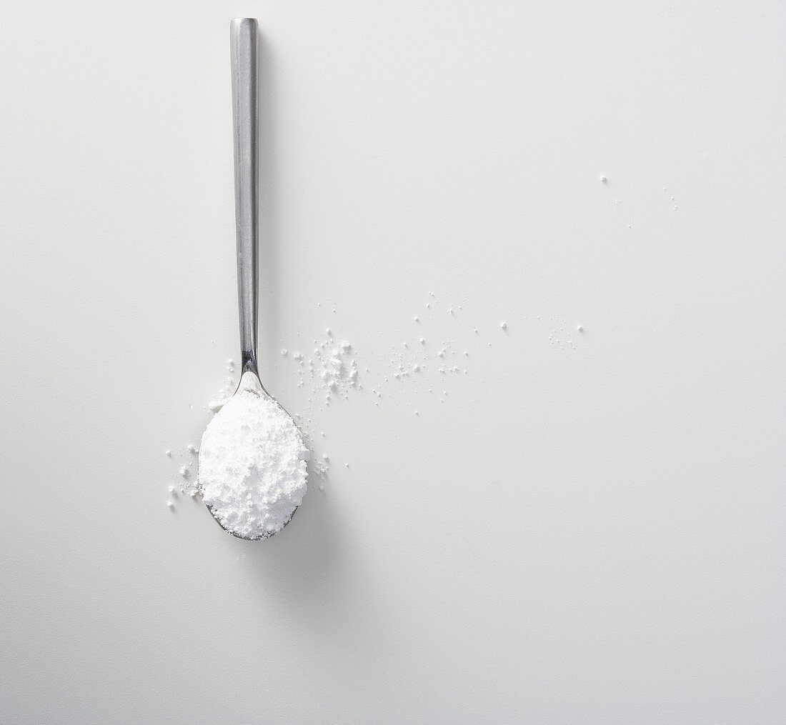 A spoonful of icing sugar