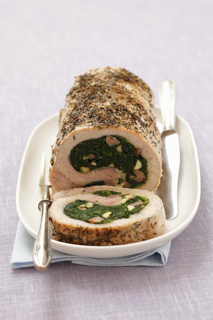 Pork roulade filled with spinach and sausage