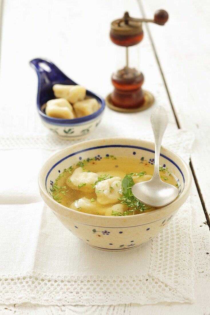 Clear broth with dumplings