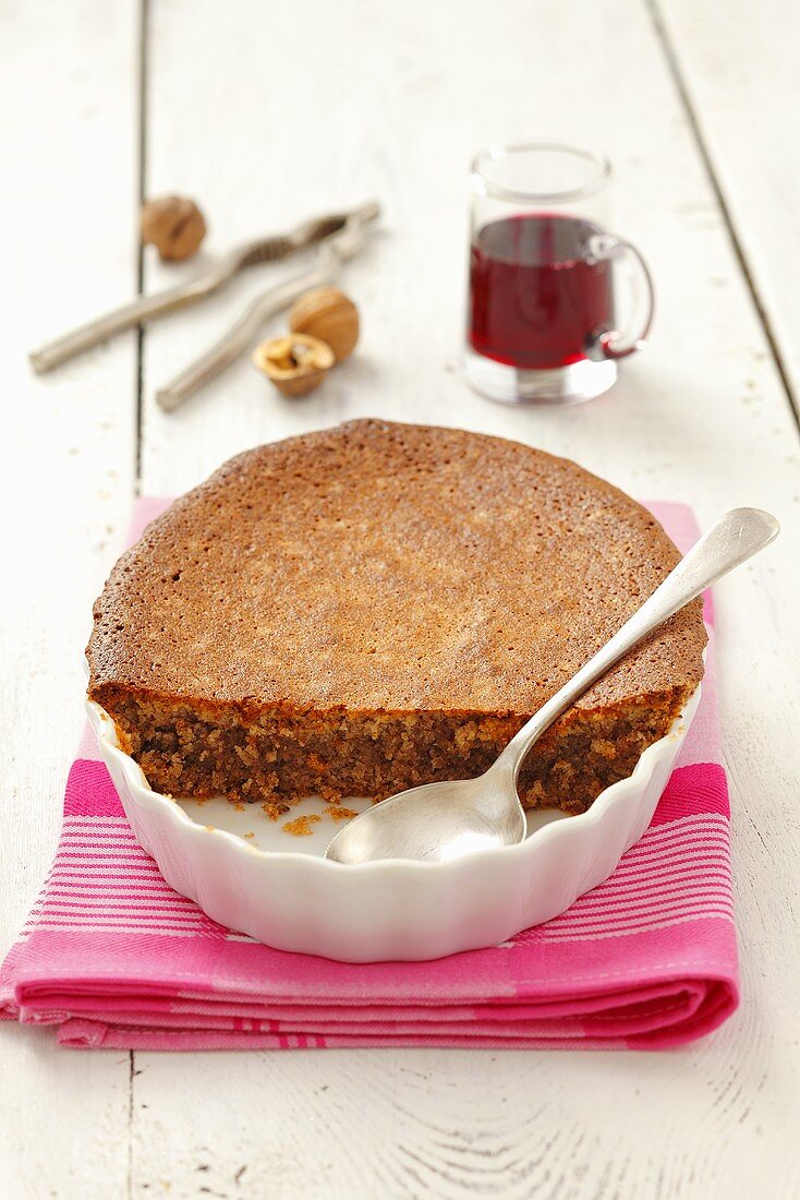 Baked almond and walnut pudding