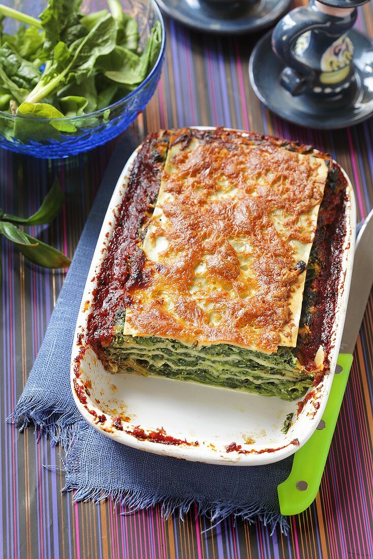 Spinach lasagne in the baking dish
