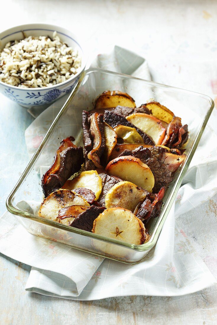 Sirloin steaks with apples and a side of rice