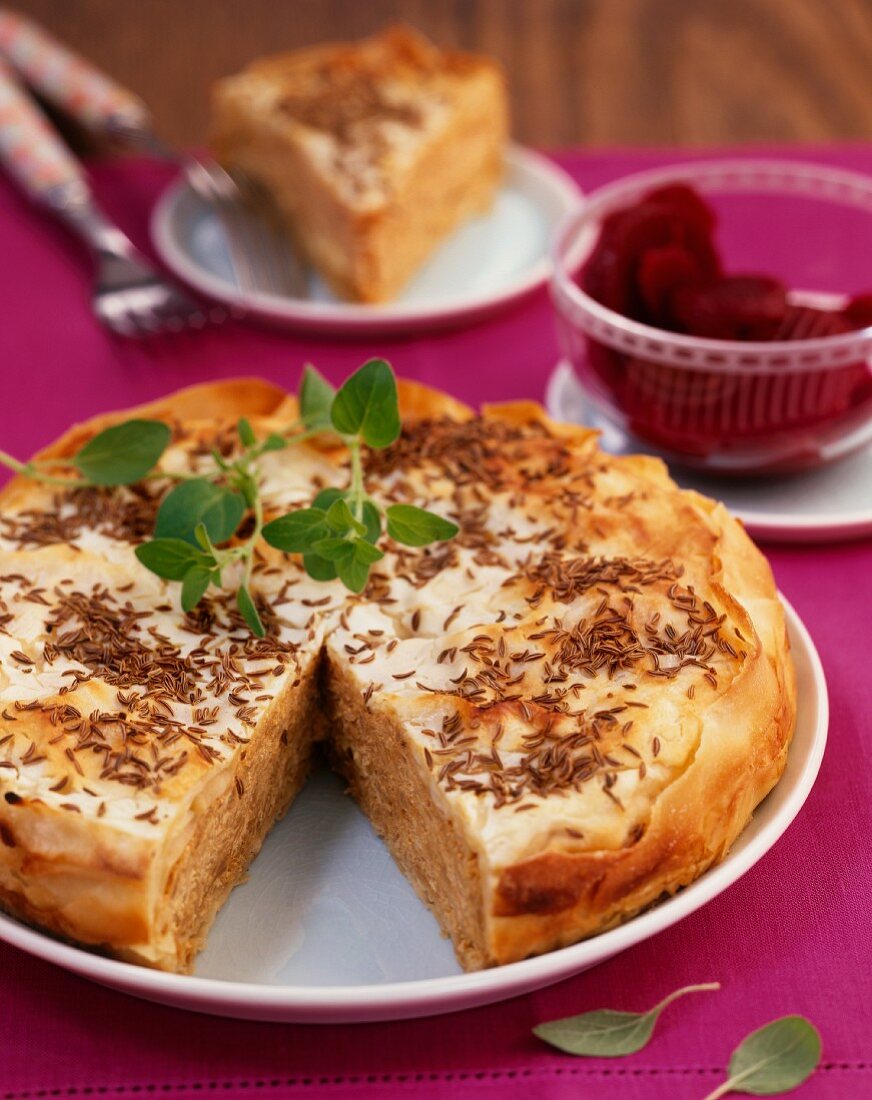 Quick sauerkraut pie made with yufka dough and caraway seeds