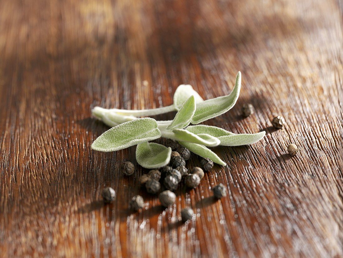 Sage leaves and peppercorns