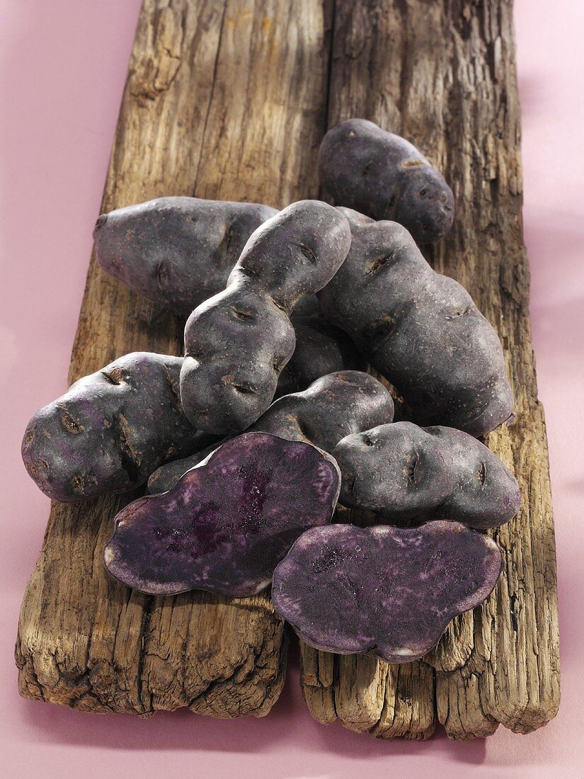 Truffle potatoes on wooden board