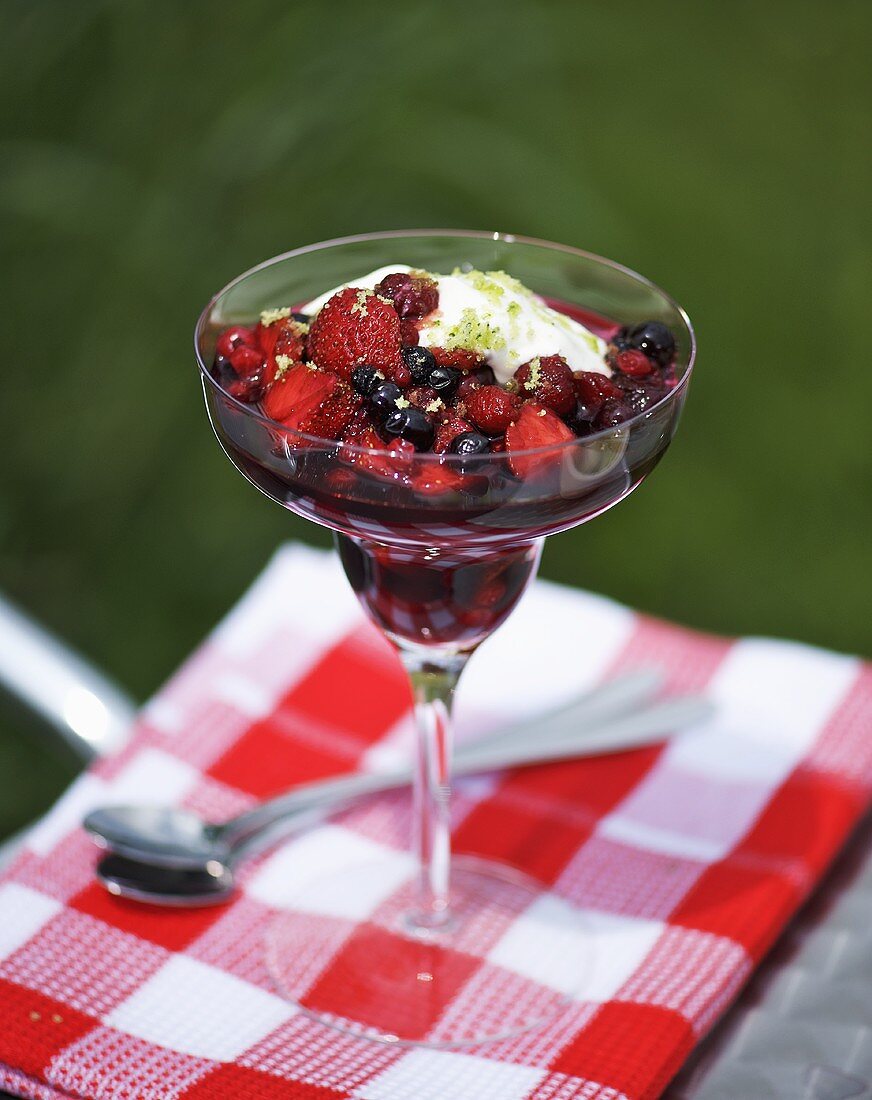Berry compote with yoghurt and basil sugar