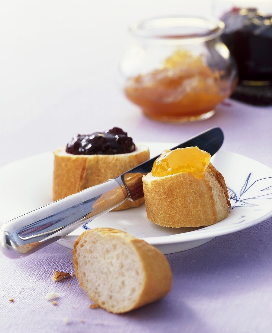 Baguette slices with apricot and blackcurrant jam