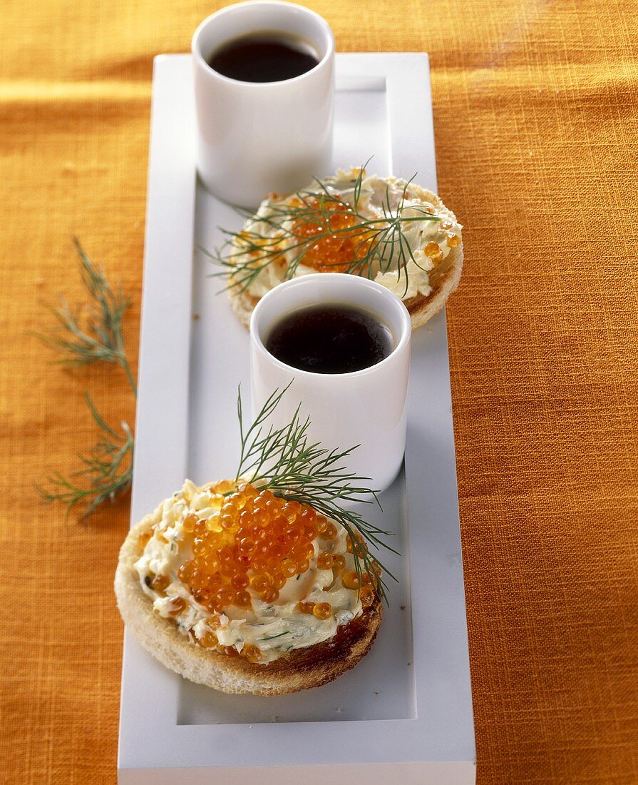 Toasted bun with butter and trout caviar