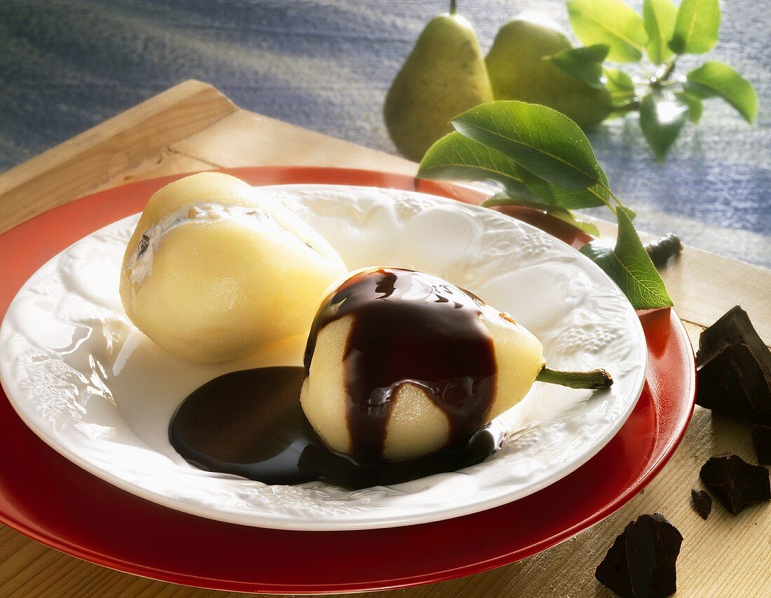Pears stuffed with quark with chocolate sauce