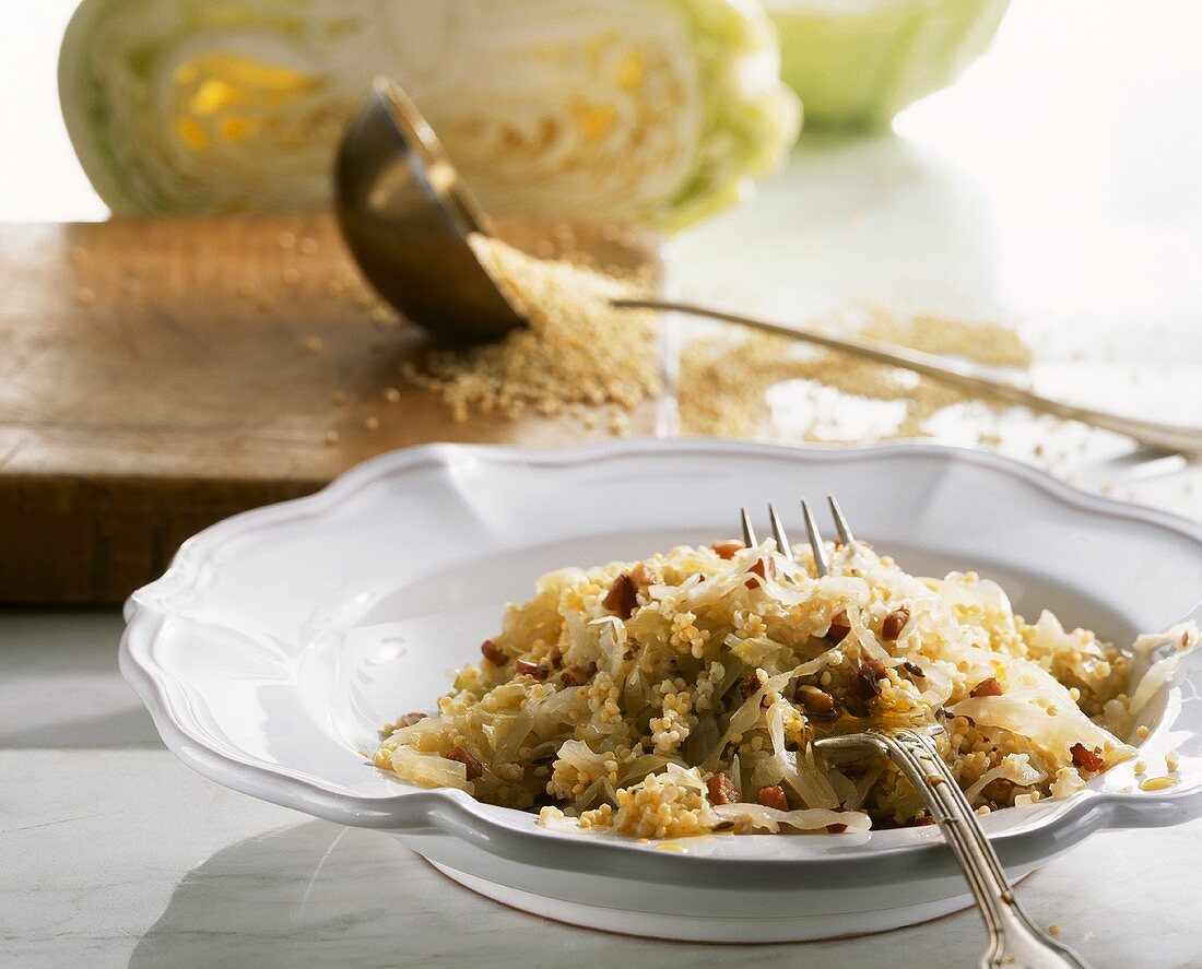 White cabbage with millet and bacon