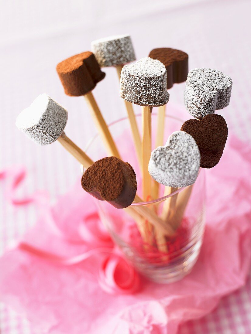 Heart-shaped chocolates on sticks