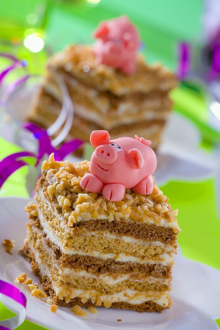 Chocolate nut cake with marzipan pig