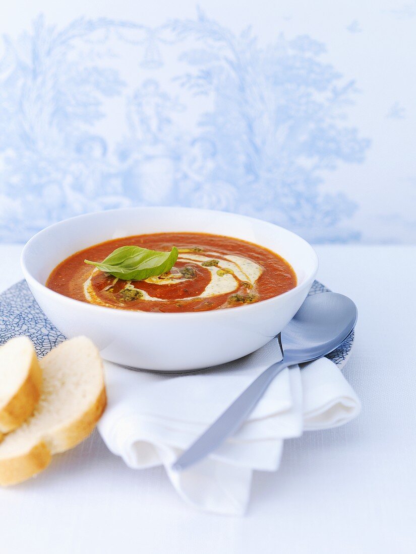 Tomato soup with pesto and crème fraîche
