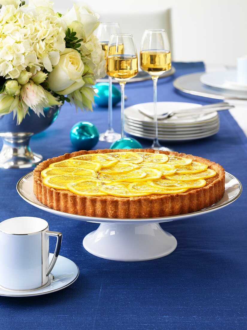 Orange and almond tart on festive table