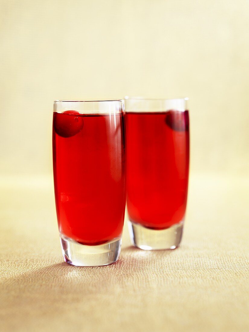 Two pomegranate drinks