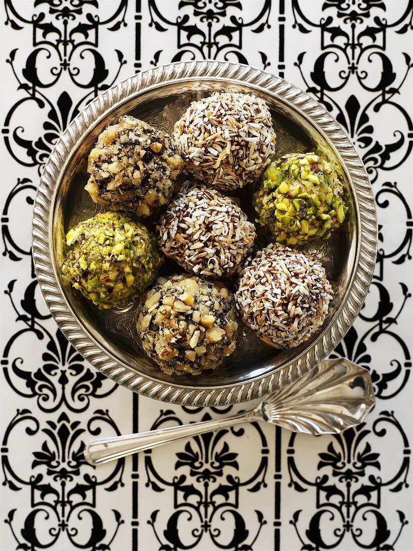 Assorted chocolate truffles in silver bowl