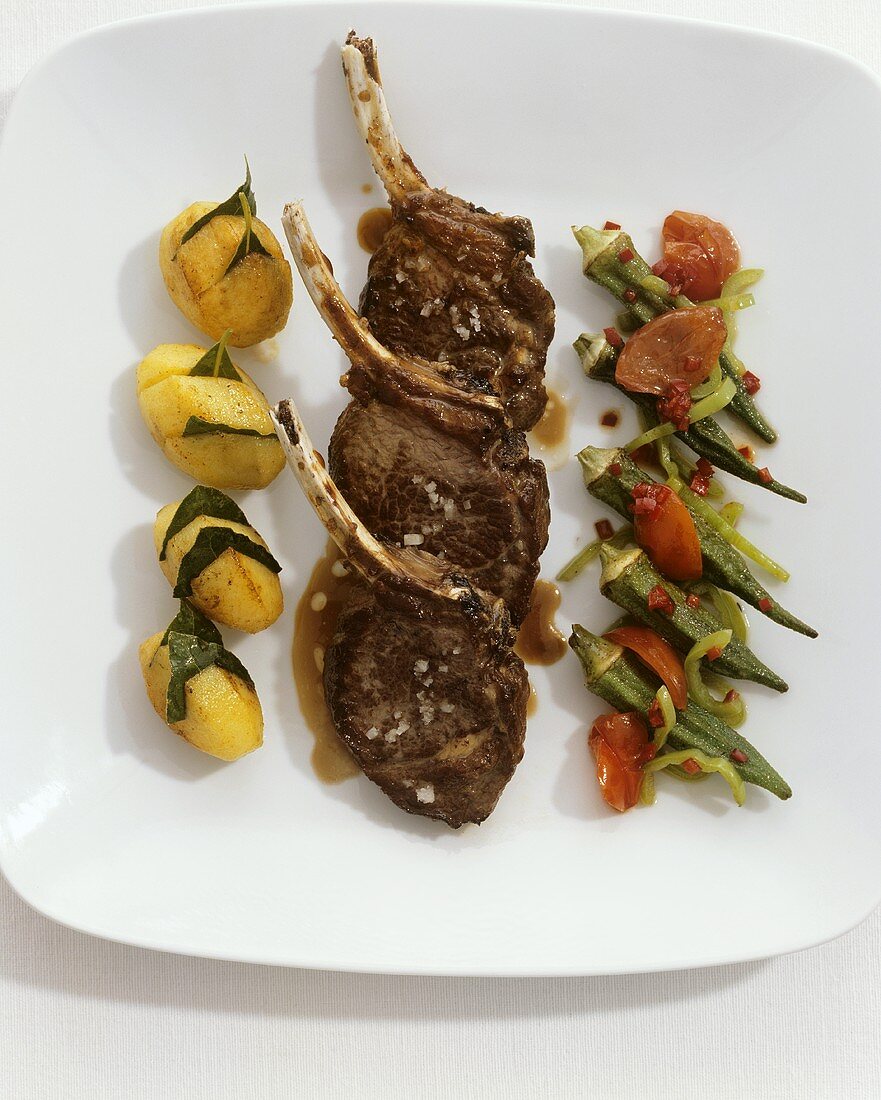 Lamb chops with bay leaf potatoes and okra pods
