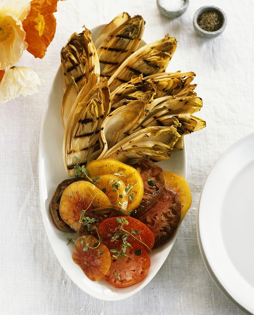 Grilled chicory with heirloom tomatoes