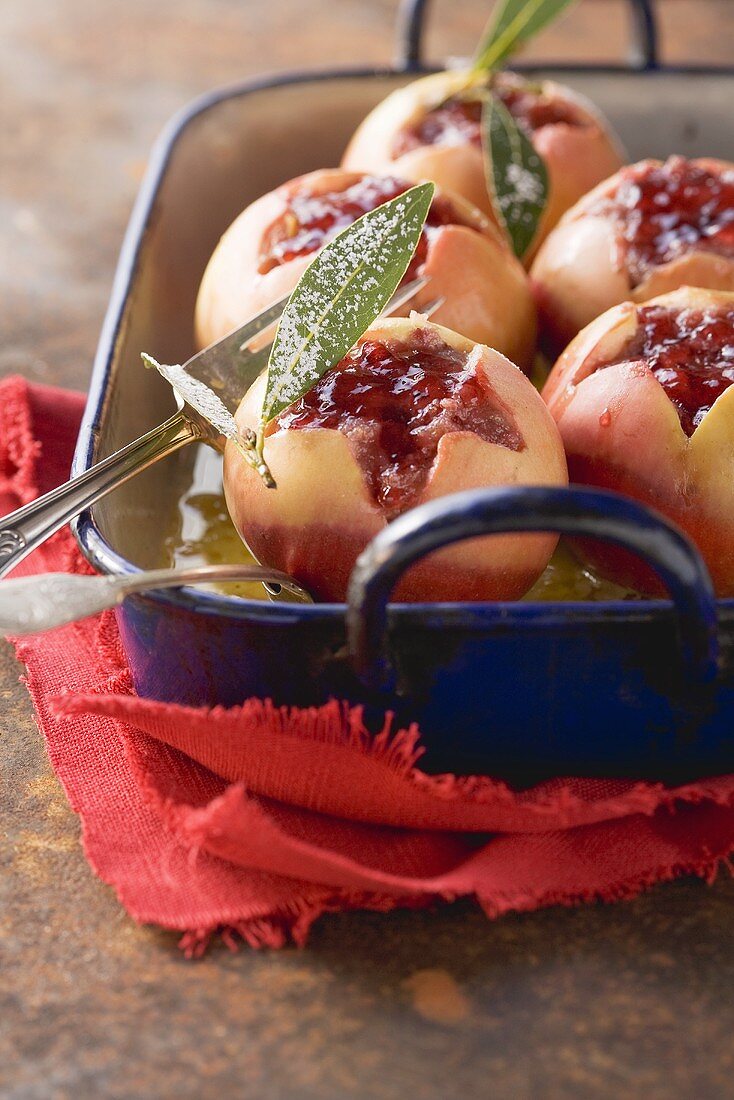 Baked apples filled with jam and nuts