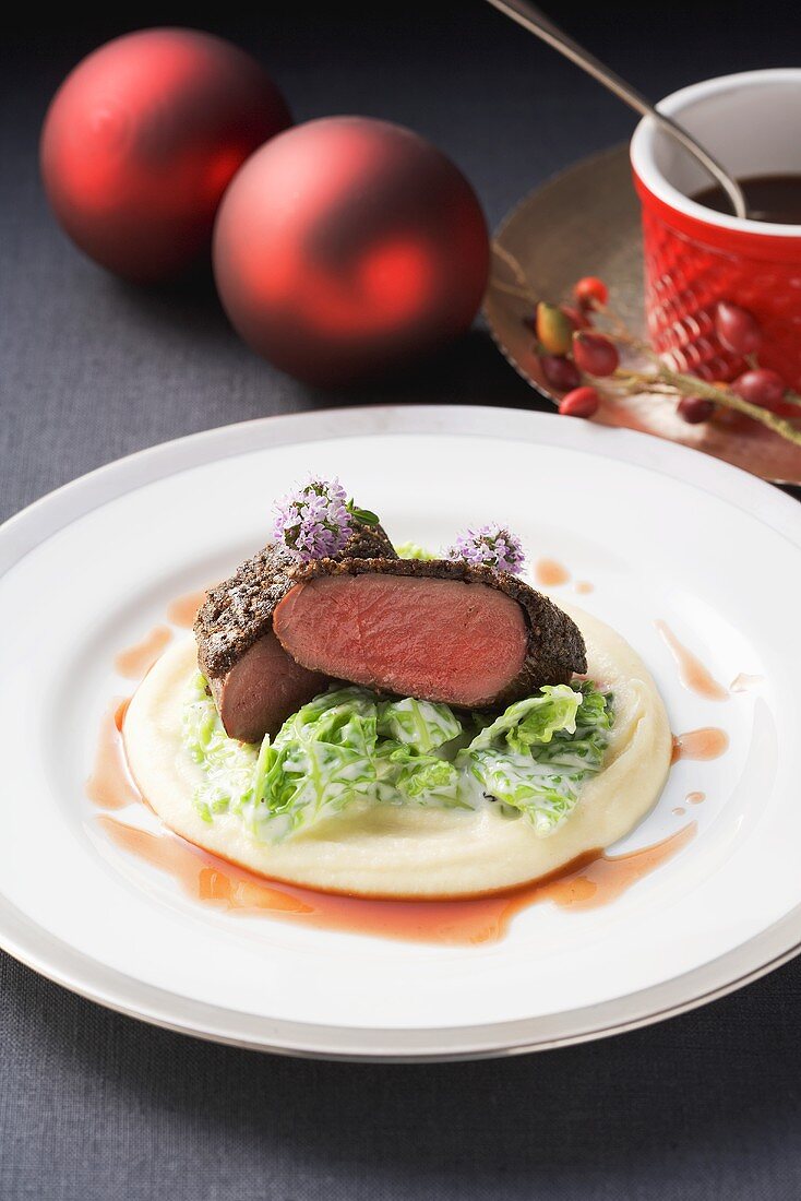 Saddle of venison with a coffee crust on creamy parsnip puree