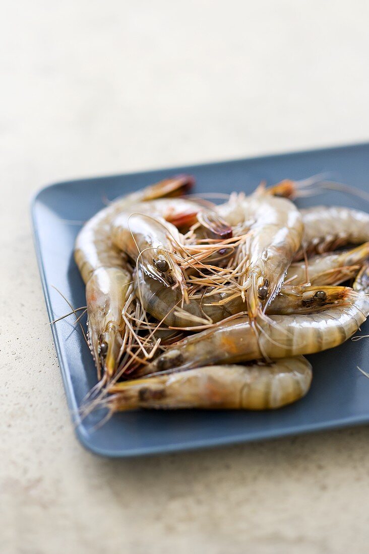 A plate of raw prawns