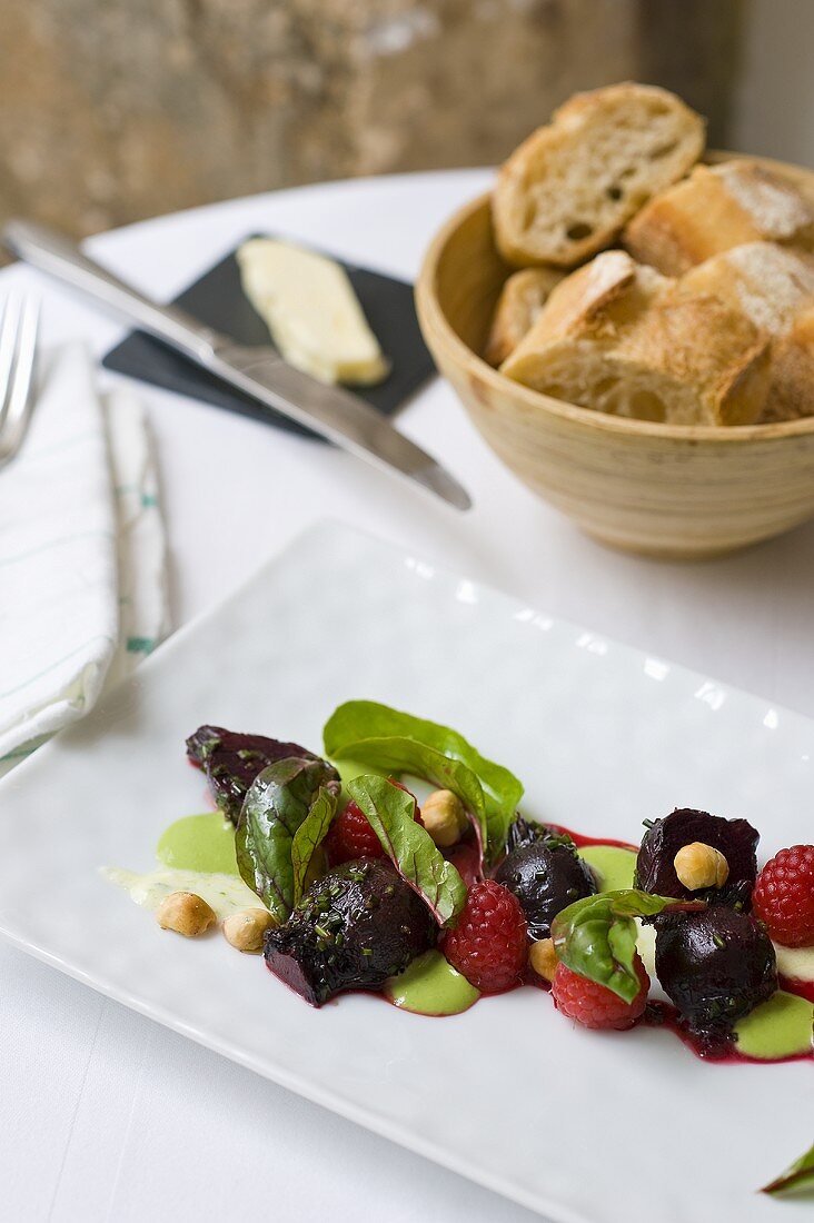 Beetroot salad with raspberries and hazelnuts