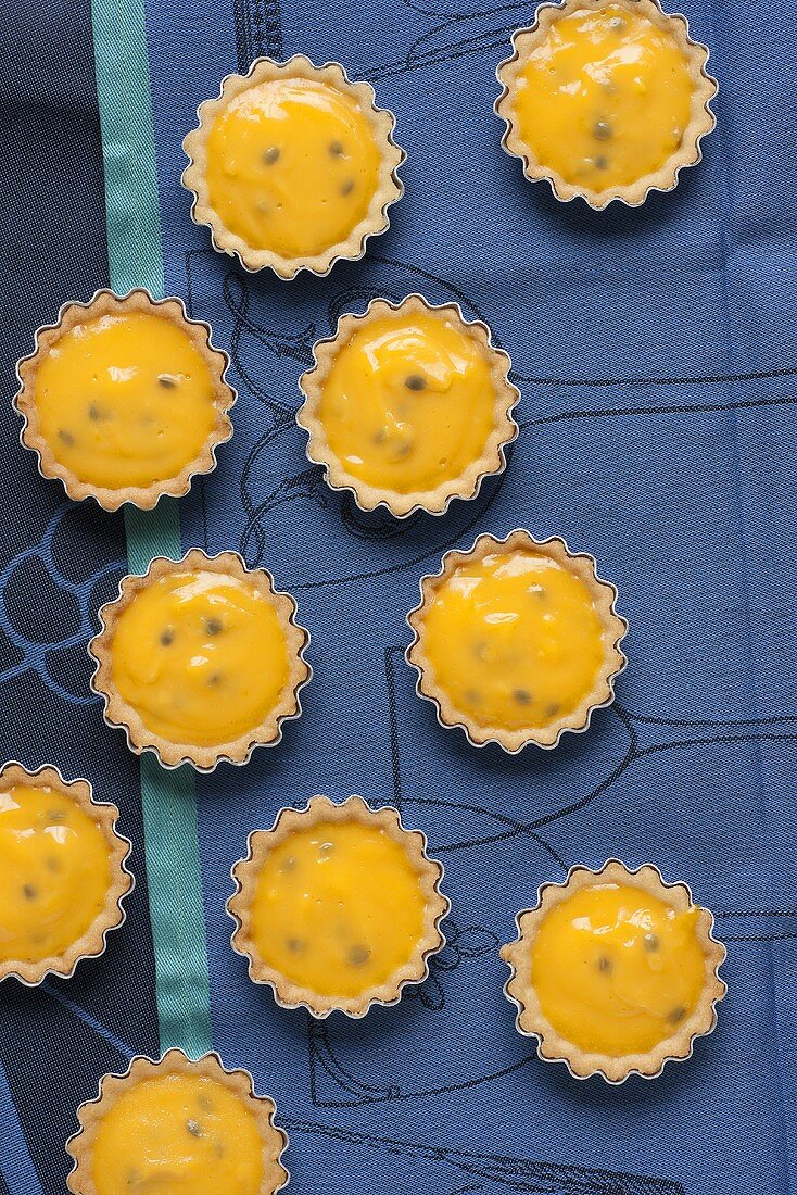 Passionfruit tartlets seen from above