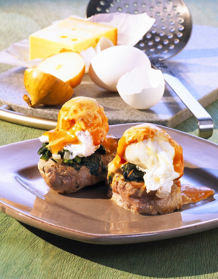 Pork tenderloin with poached egg and red Hollandaise sauce