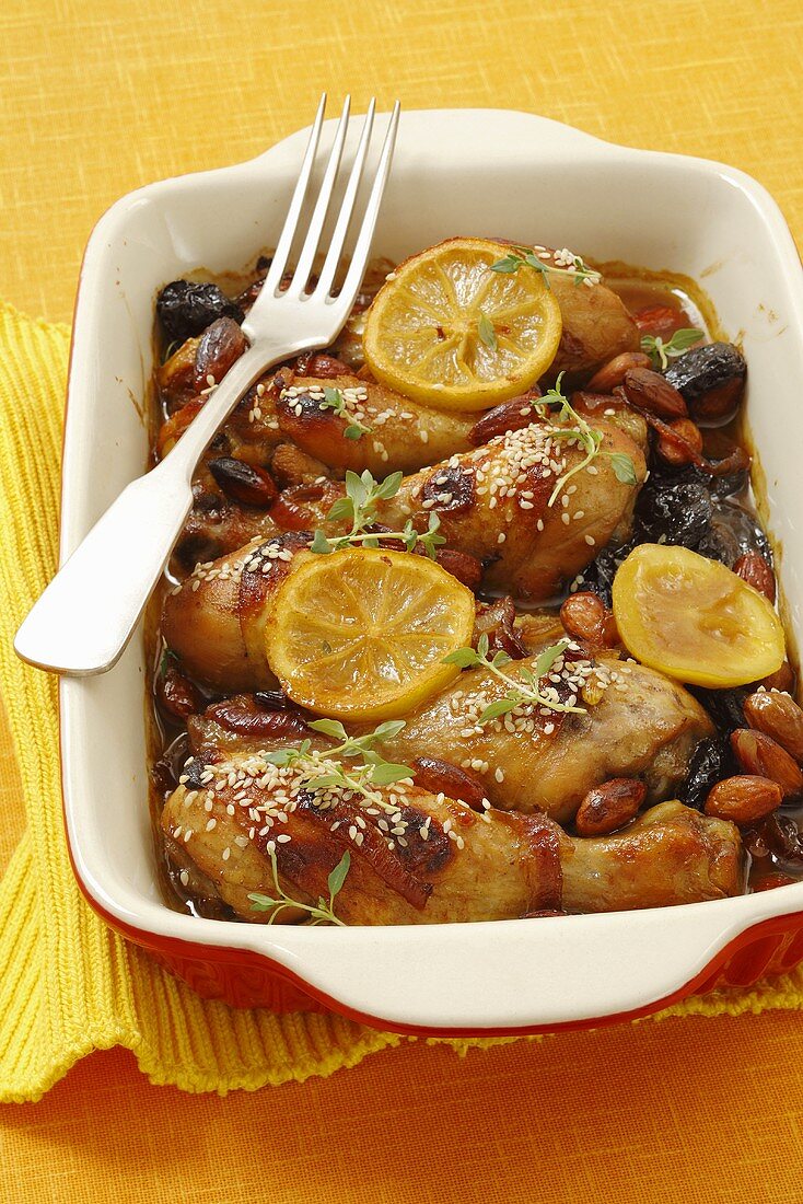 Chicken legs with almonds, dates, lemon and honey