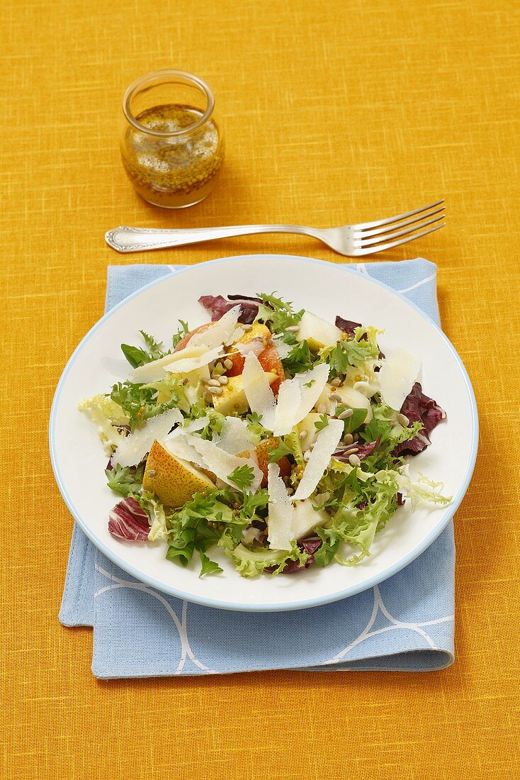 Mixed leaf salad with pears, Parmesan and a mustard dressing