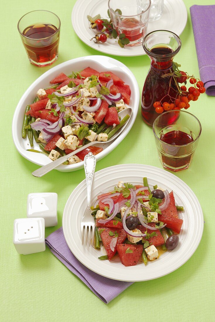 Watermelon salad with beans, feta and red onions
