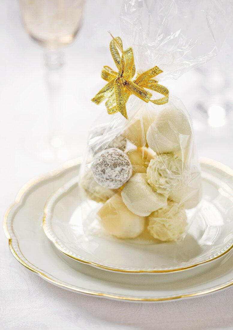 White chocolate pralines packed in a bag