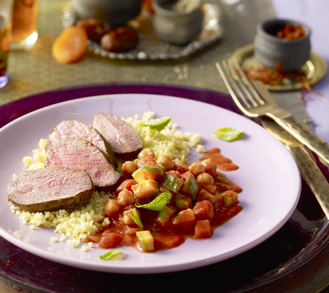 Lamb fillet with couscous and a courgette medley
