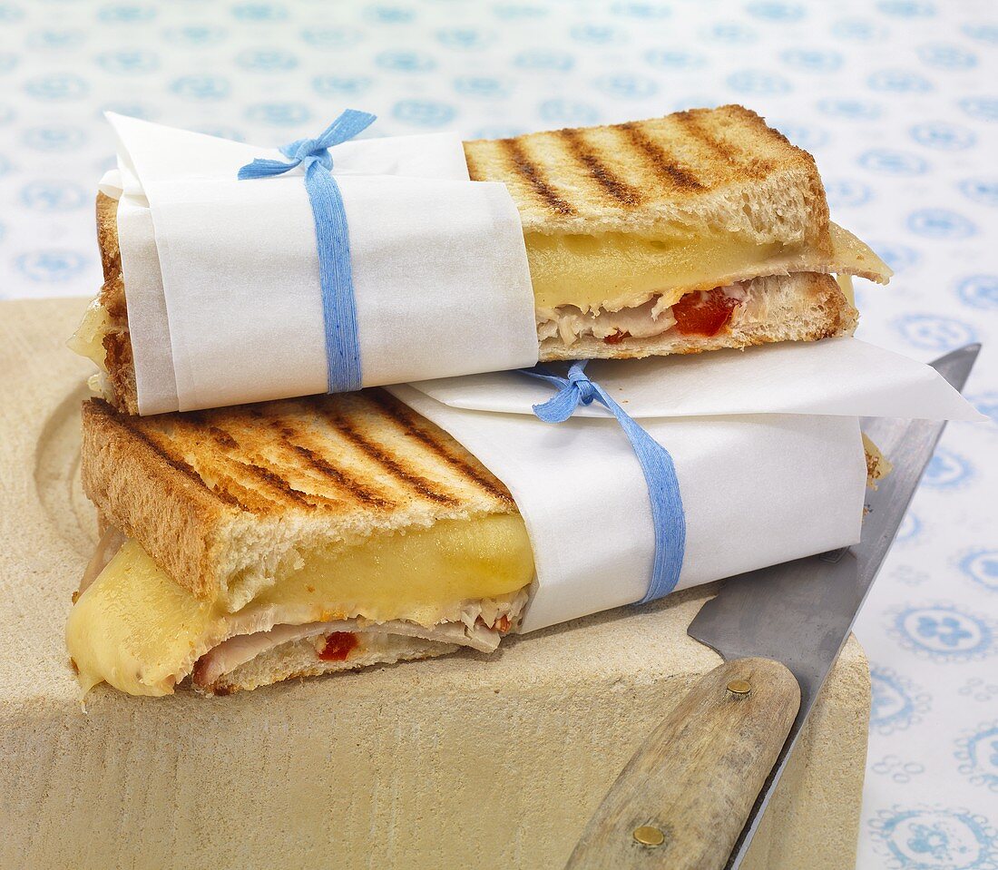Toasted cheese sandwiches with cold meat