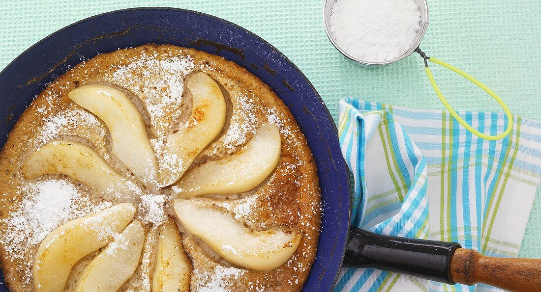 Oven-baked pancake with pears