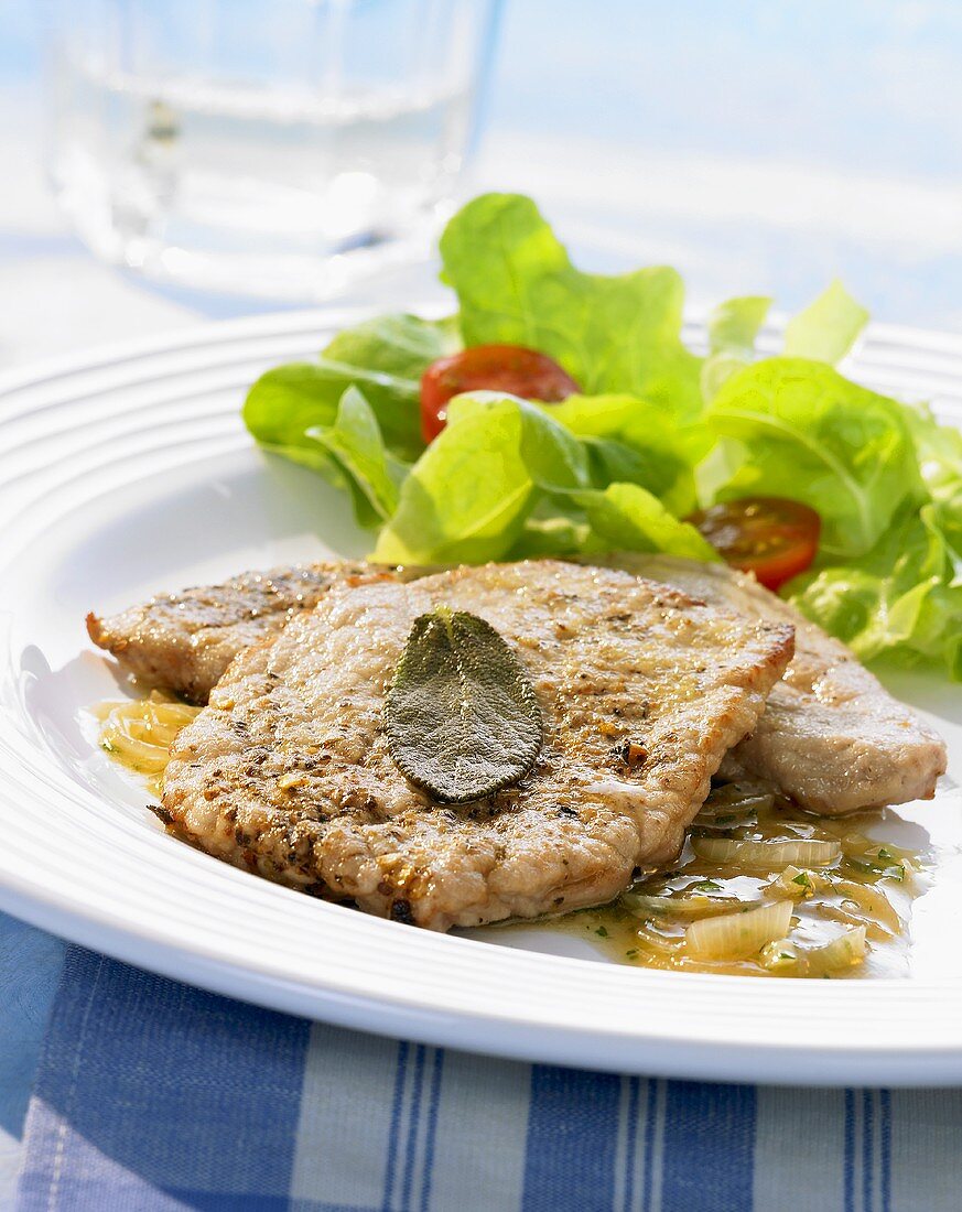 Veal escalope with sage and a salad garnish (Greece)