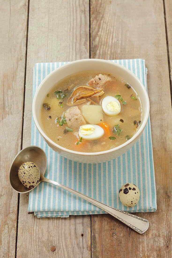 Zalewajka (soup with potatoes, mushrooms, bread and quails' eggs, Poland)