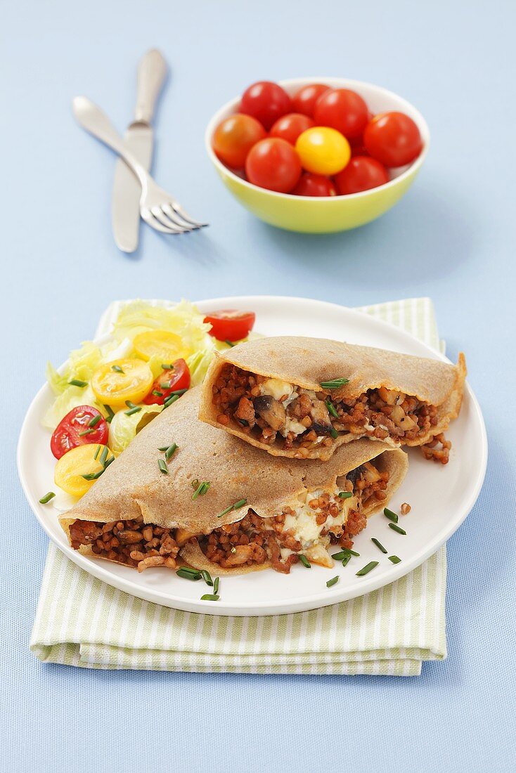 Buckwheat crepes with minced meat and mushrooms