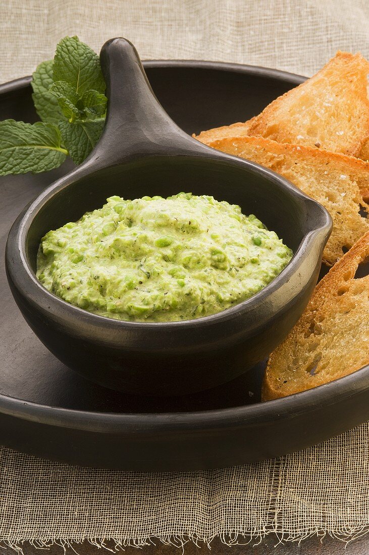 A pea dip with bread