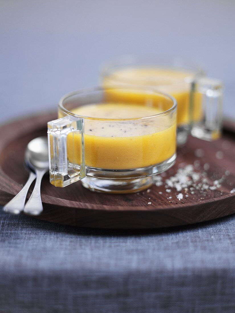 Carrot and Riesling soup in glass soup cups