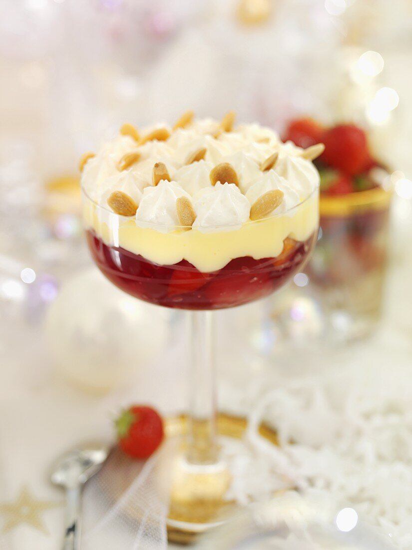 Strawberry trifle with flaked almonds for Christmas dinner