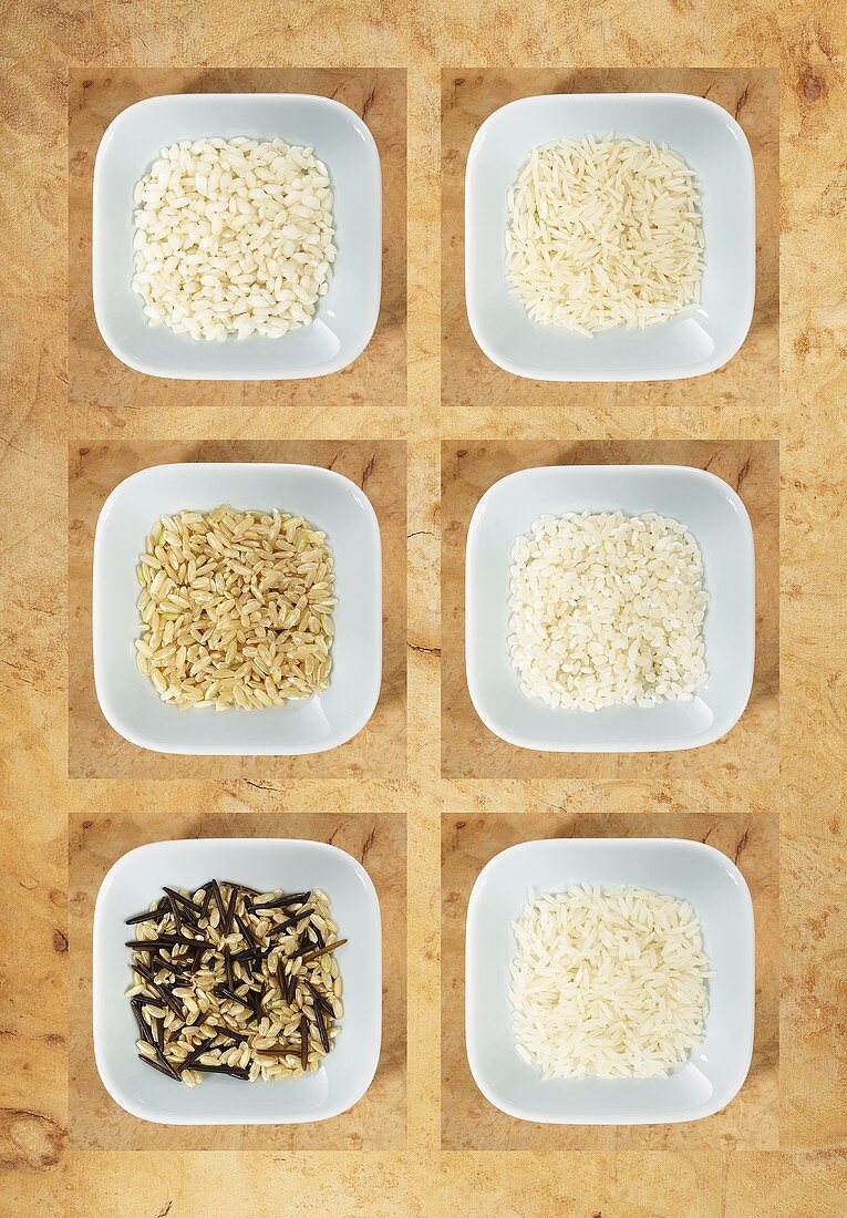 Various types of rice in bowls, seen from above