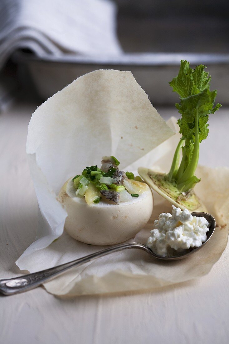 Radish filled with fish, potatoes and chives