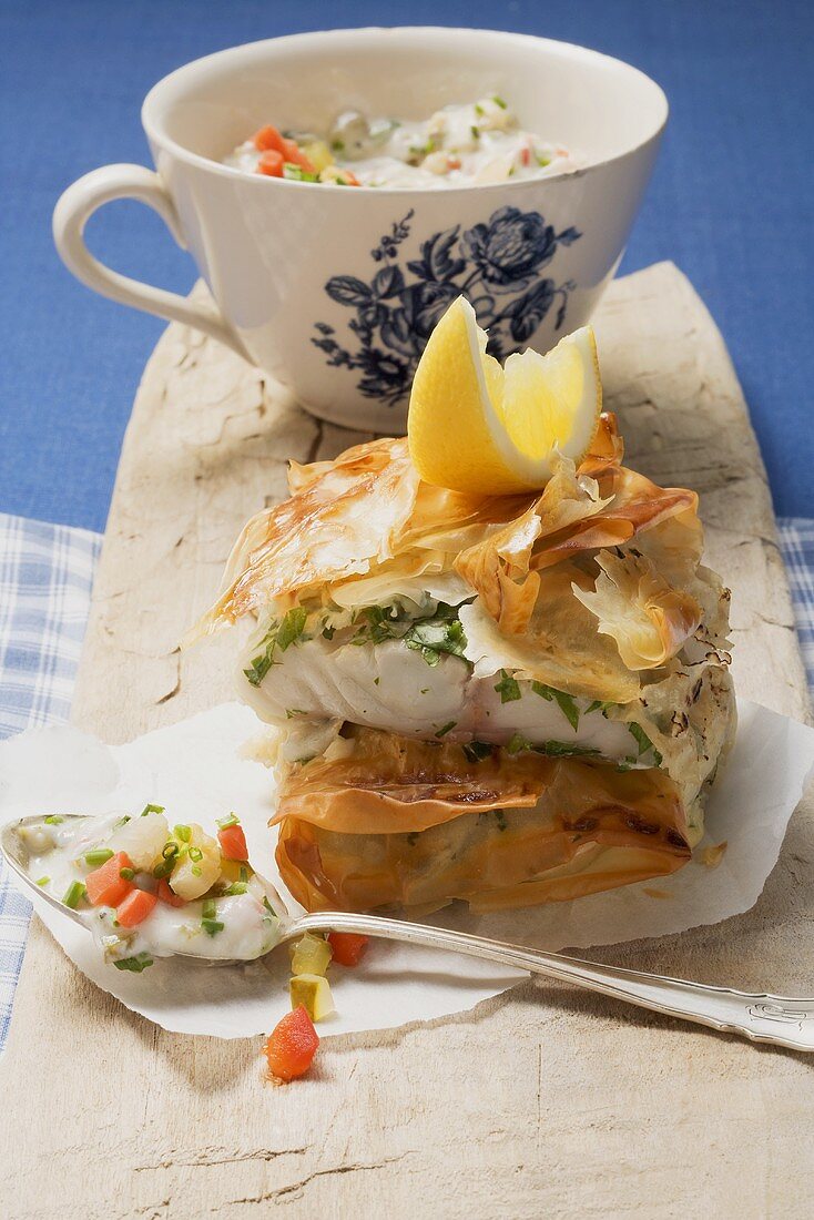 Fried herb fish wrapped in puff pastry