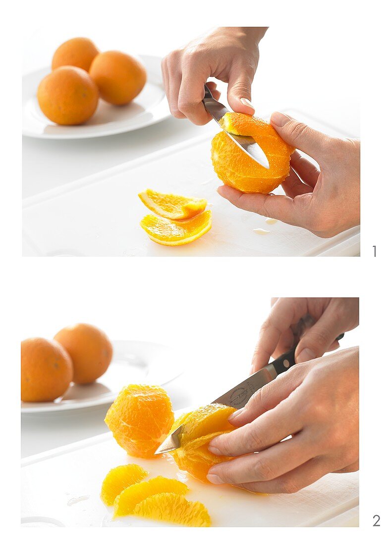 An orange being filleted