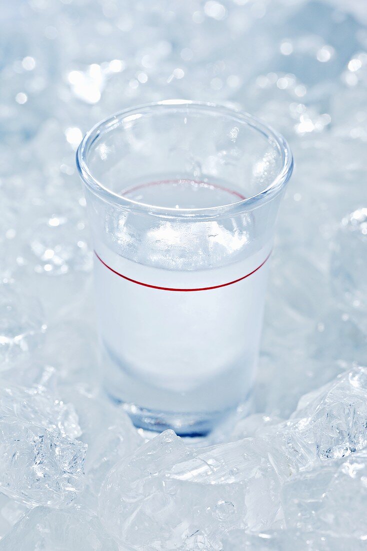 A shot glass on ice