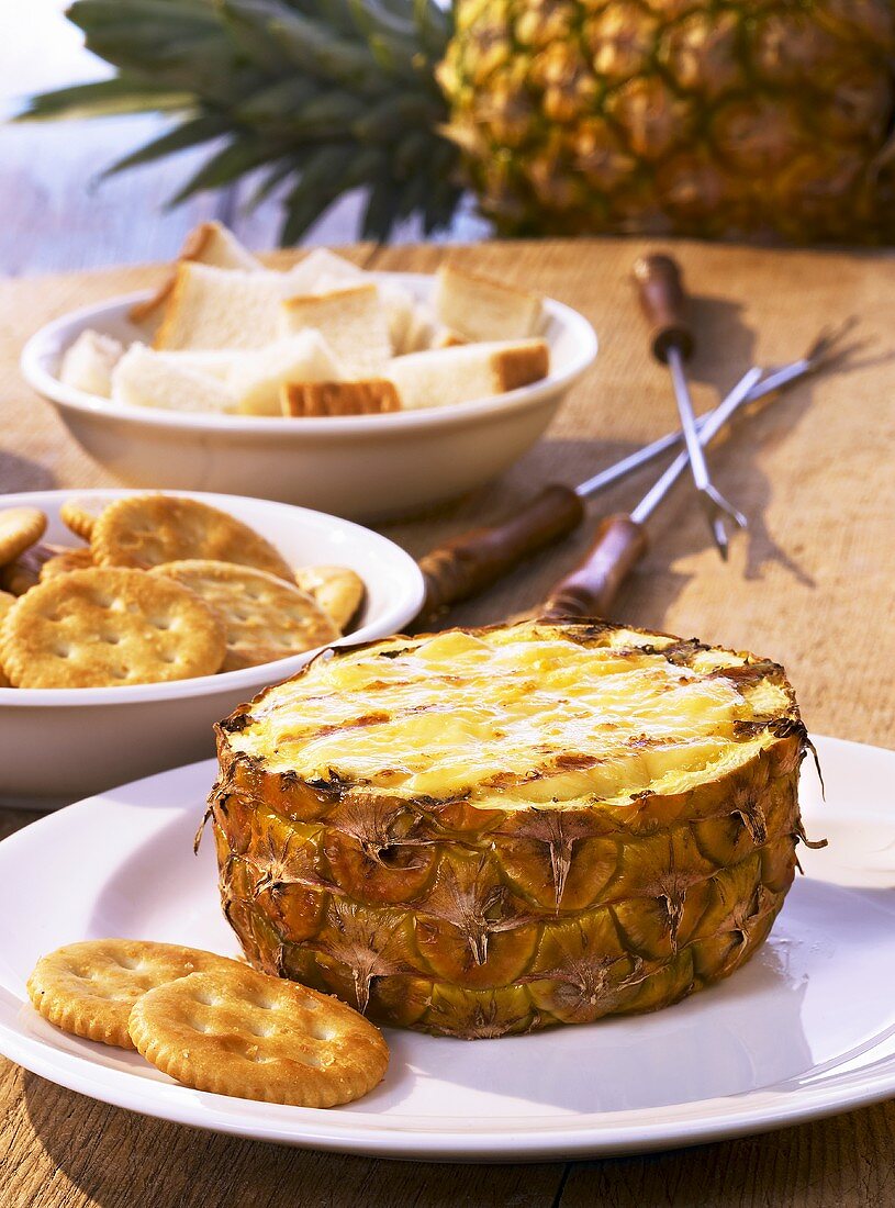 Pineapple with cheese fondue