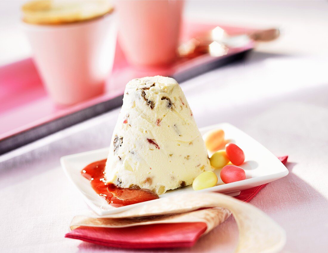 Rhubarb ice cream parfait with strawberry sauce