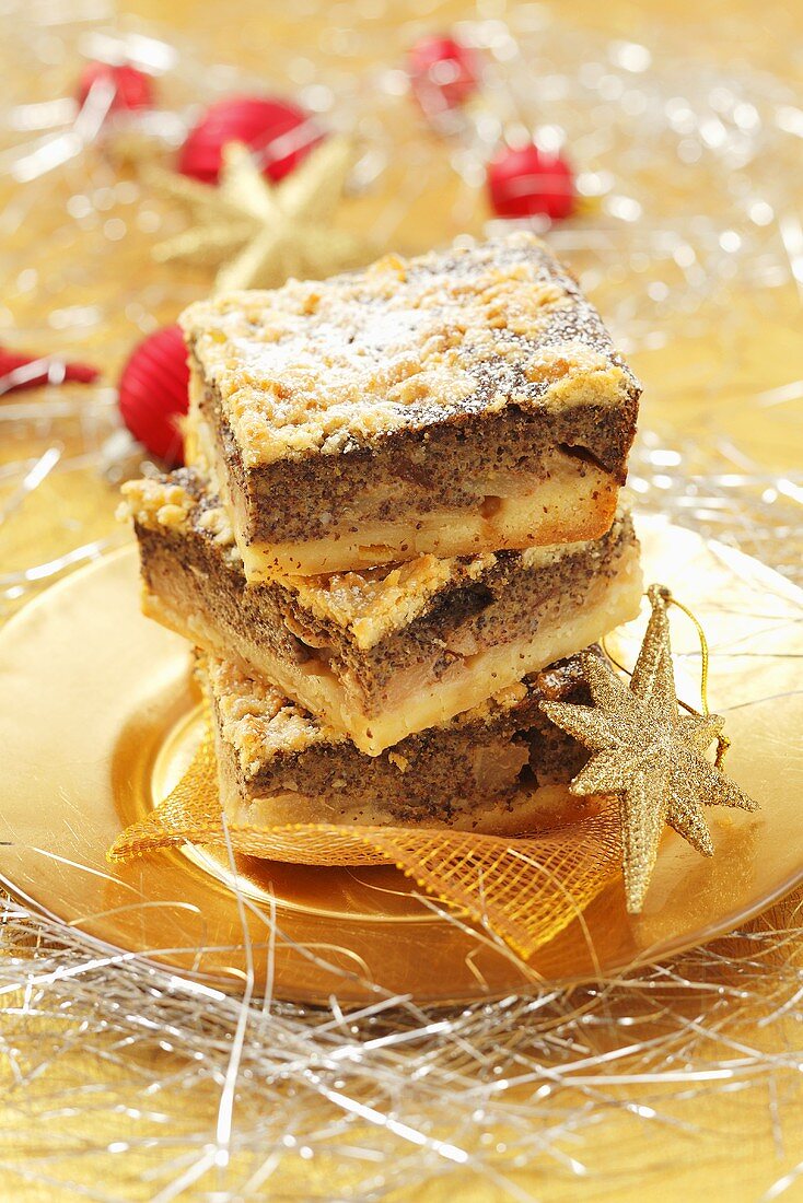 Slices of Christmas apple and poppyseed cake