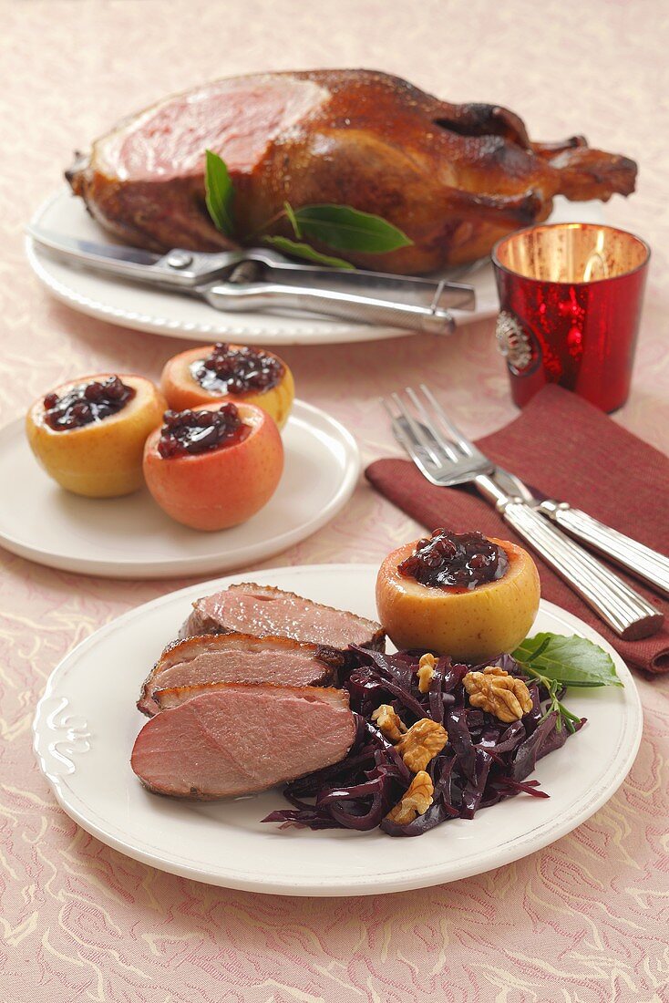 Duck with red cabbage and baked apple